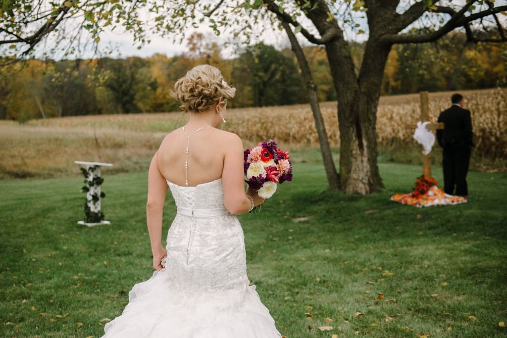 bride approaching groom for first look