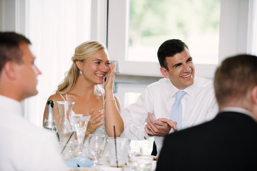 bride and groom reaction during speeches