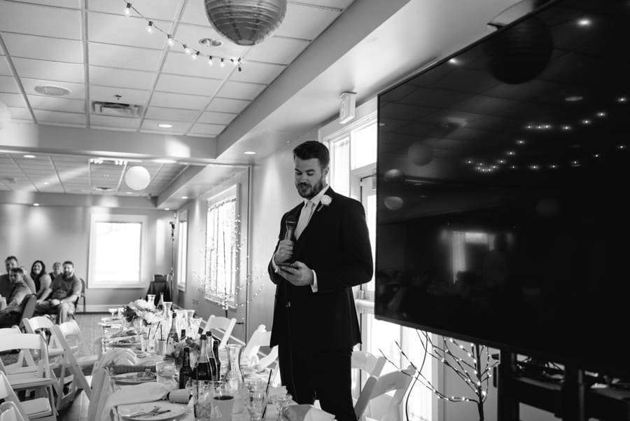 groommen introducing video during speeches