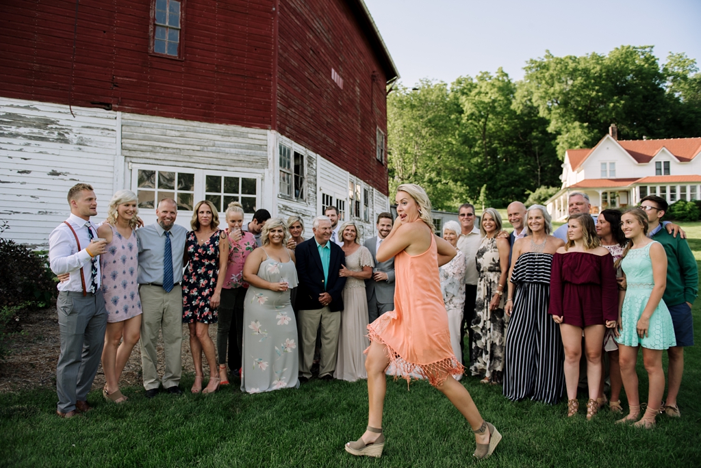 accidental guest photobomb at outdoor wedding