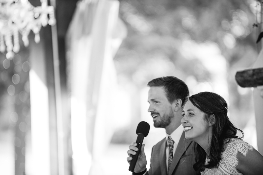 bride and groom talking at wedding reception