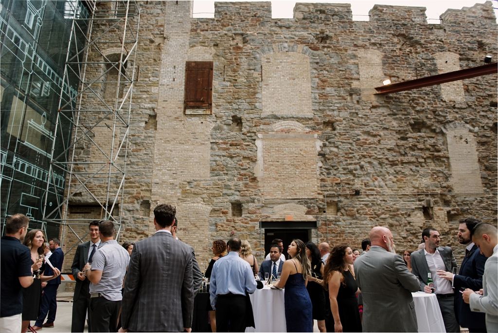 wedding guests mingle during cocktail hour