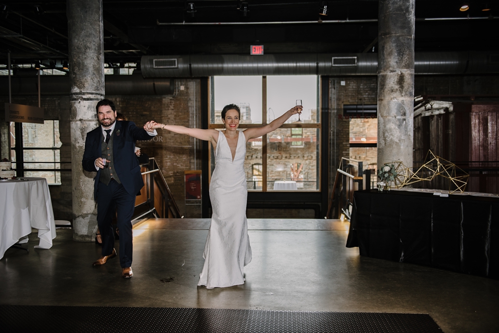 bride and groom arriving at wedding reception