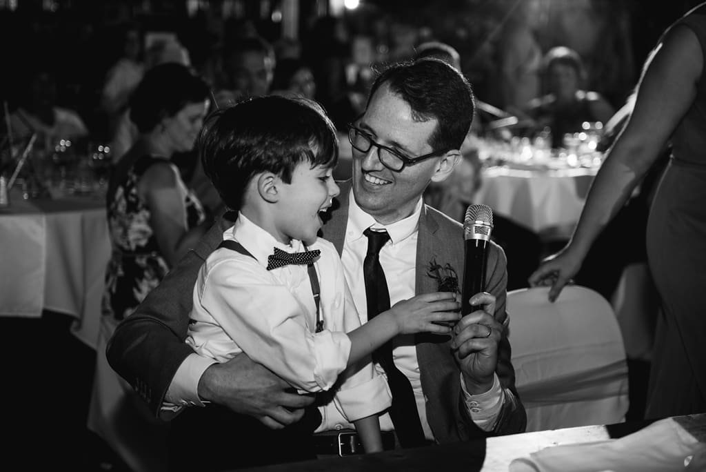 boy gives speech at wedding reception
