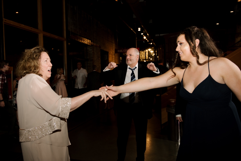 mother of groom dances at wedding reception