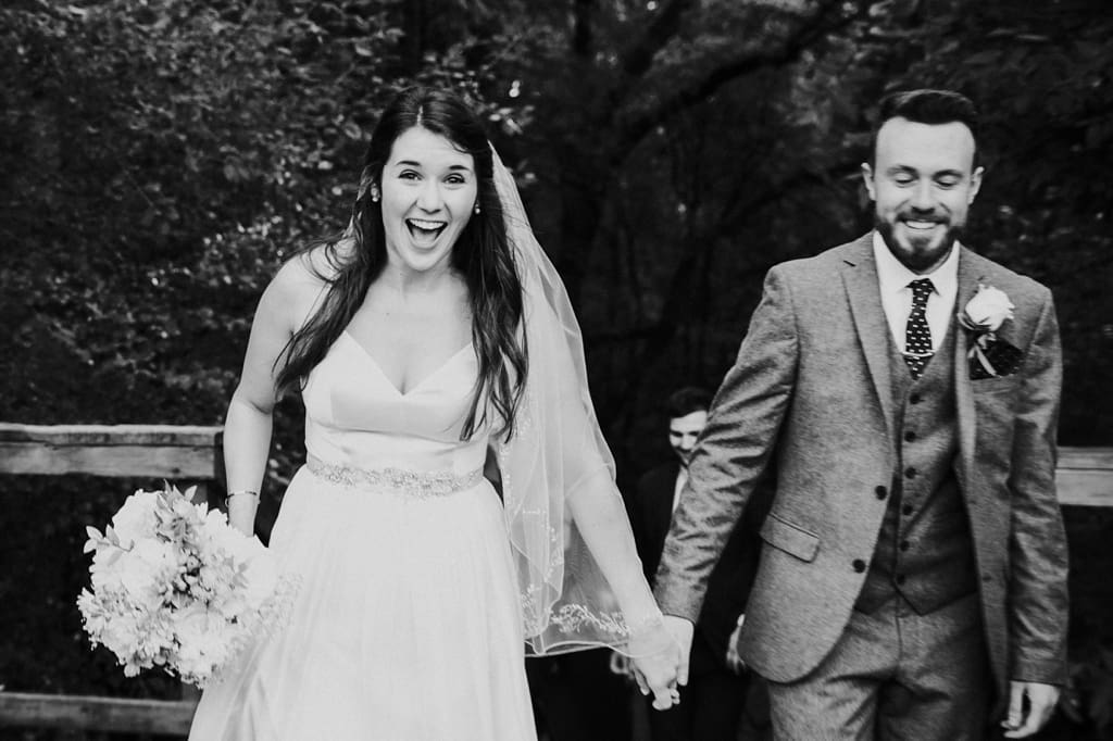 bride and groom celebrating after ceremony