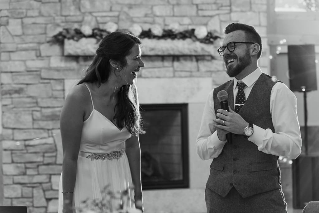 bride and groom making wedding speech