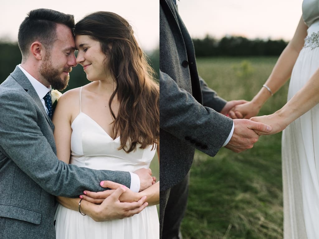 bride and groom embracing and holding hands