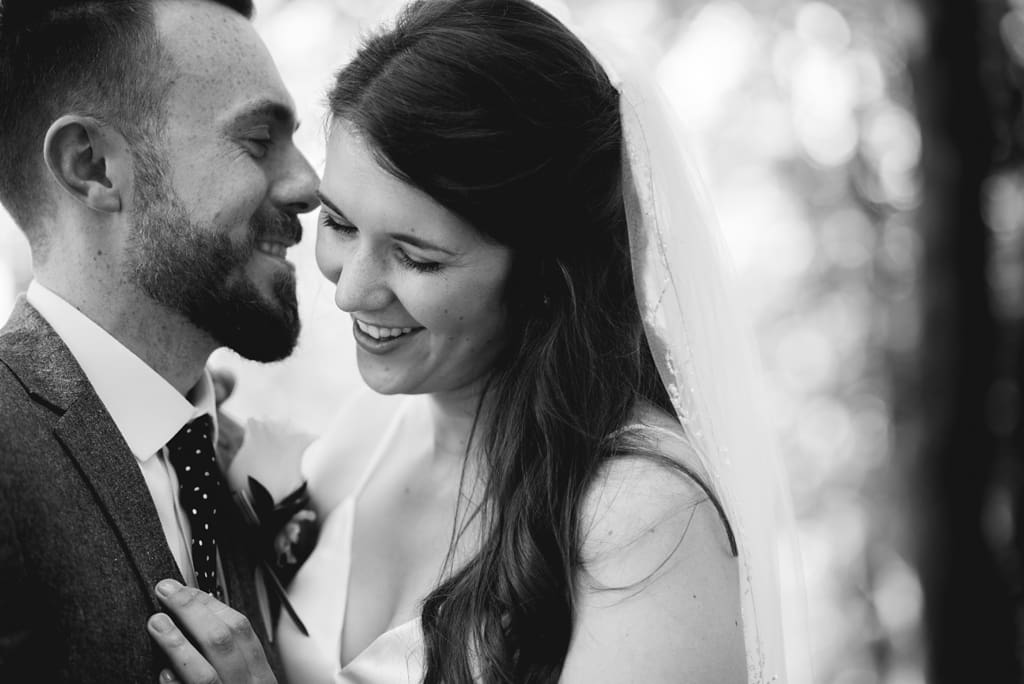 romantic portrait of bride and groom before wedding