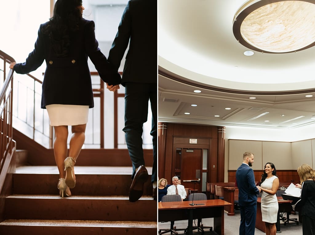 bride and groom walking up stairs, exchanging vows in city hall