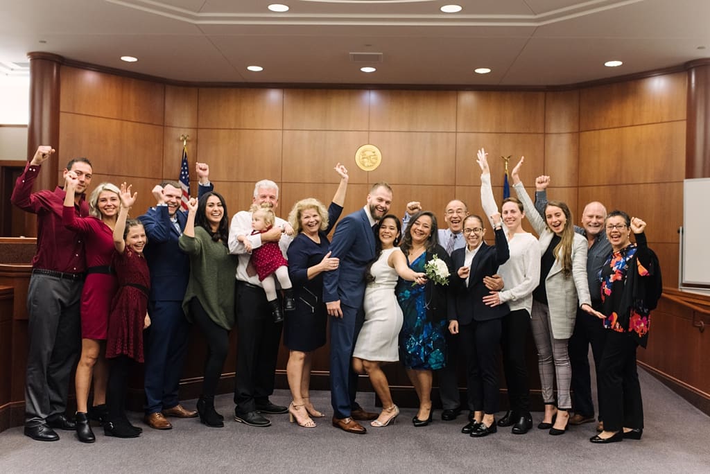 family celebrating wedding at city hall