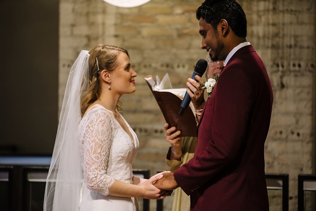groom says vows during five event center wedding