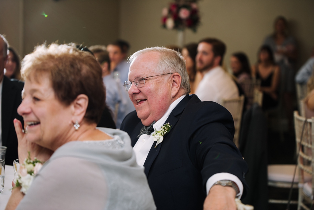 wedding guests enjoy reception at minneapolis golf club