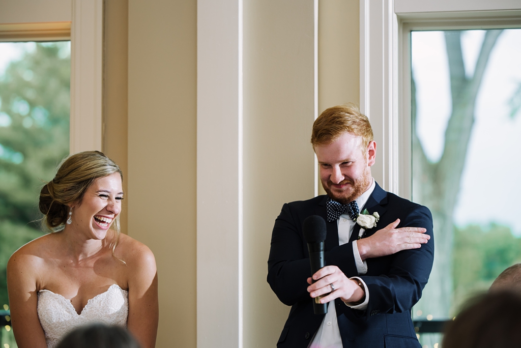 groom gives speech at reception