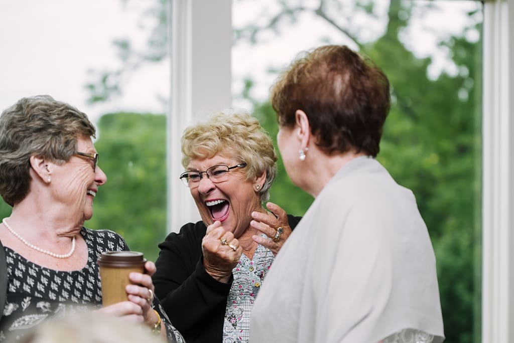 wedding guests enjoy reception at minneapolis golf club