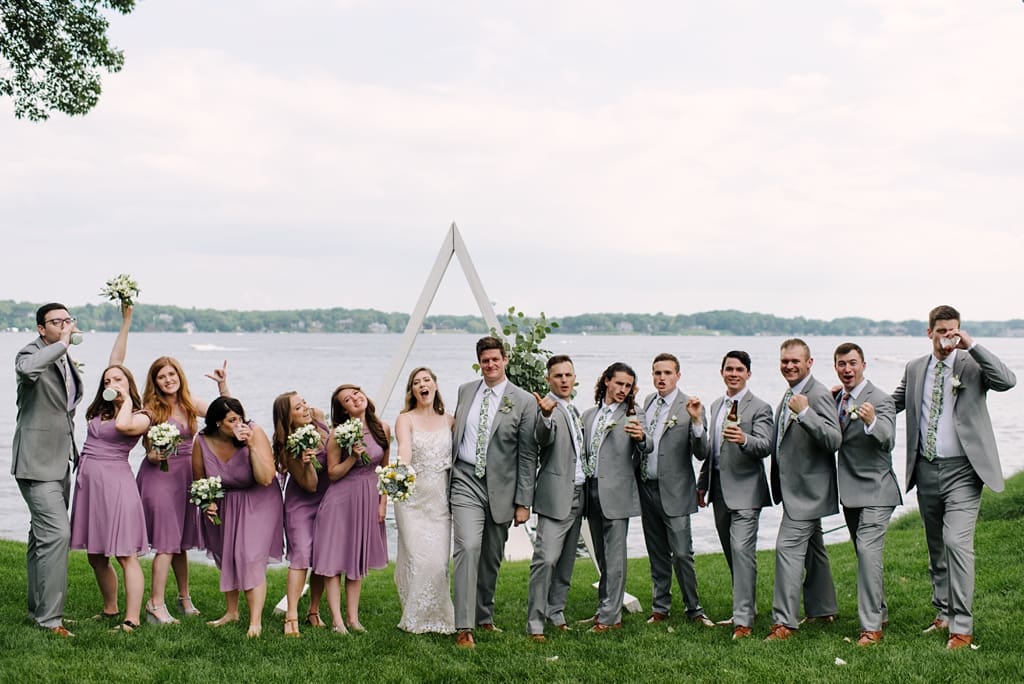 wedding party cheers lake minnetonka backyard ceremony