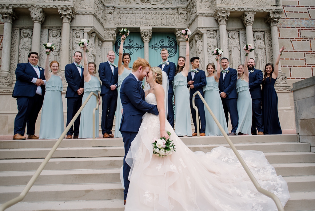 wedding party cheers newlyweds outside st paul chapel