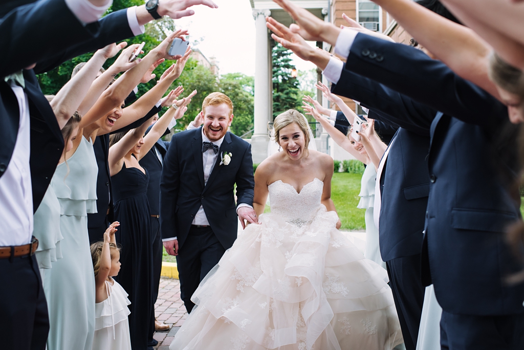 newlyweds arrive at reception venue