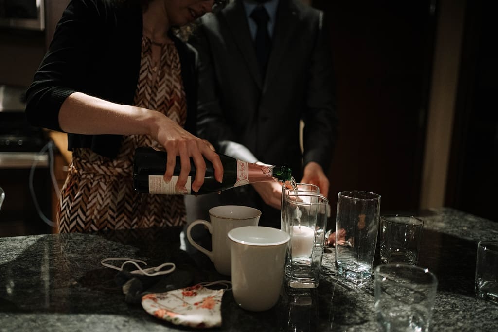 celebrating elopement with champagne and friends