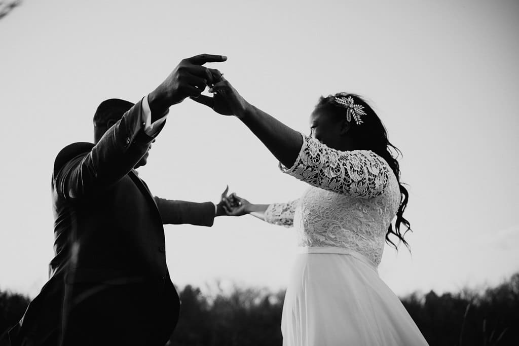 couple dancing outside with clear skies silhouette