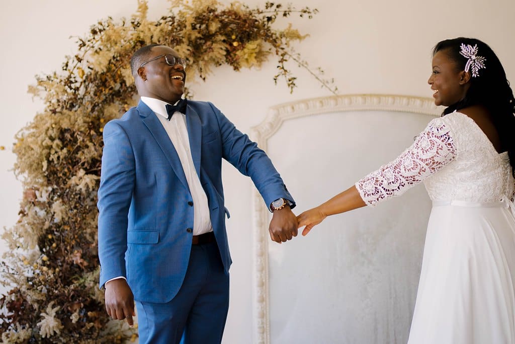 microwedding couple dancing in photo studio