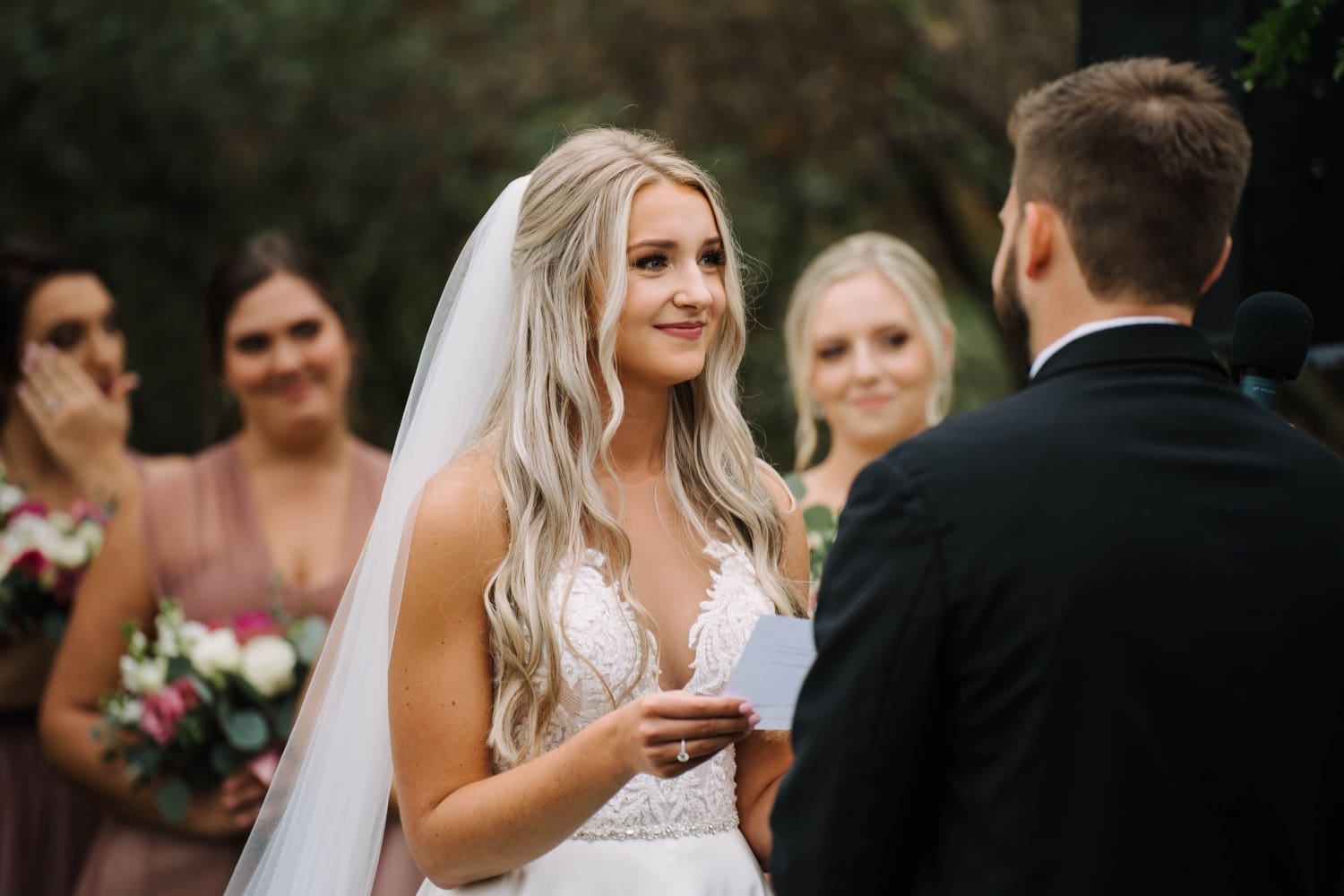 exchanging vows at outdoor minnesota wedding