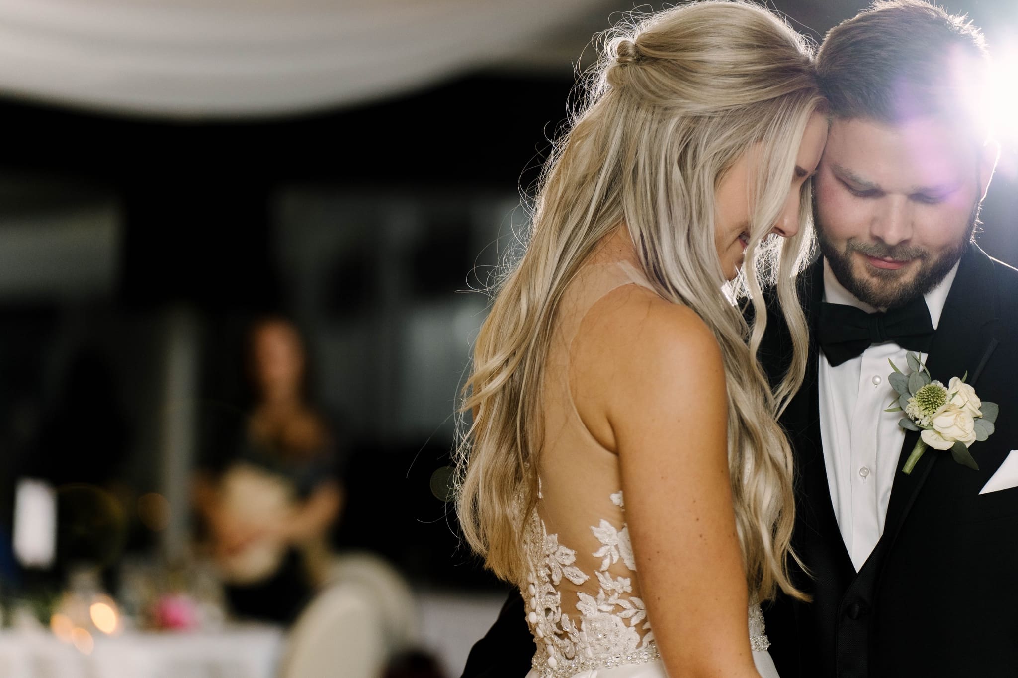 bride and groom share first dance after fall outdoor wedding