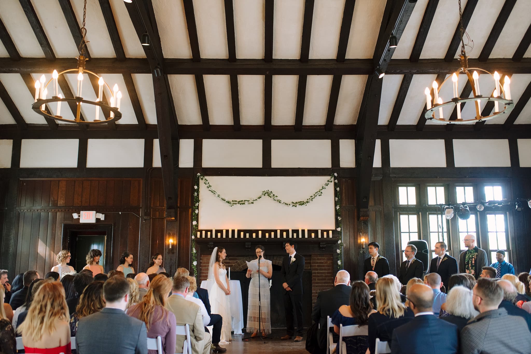 wirth chalet fireplace room wedding ceremony