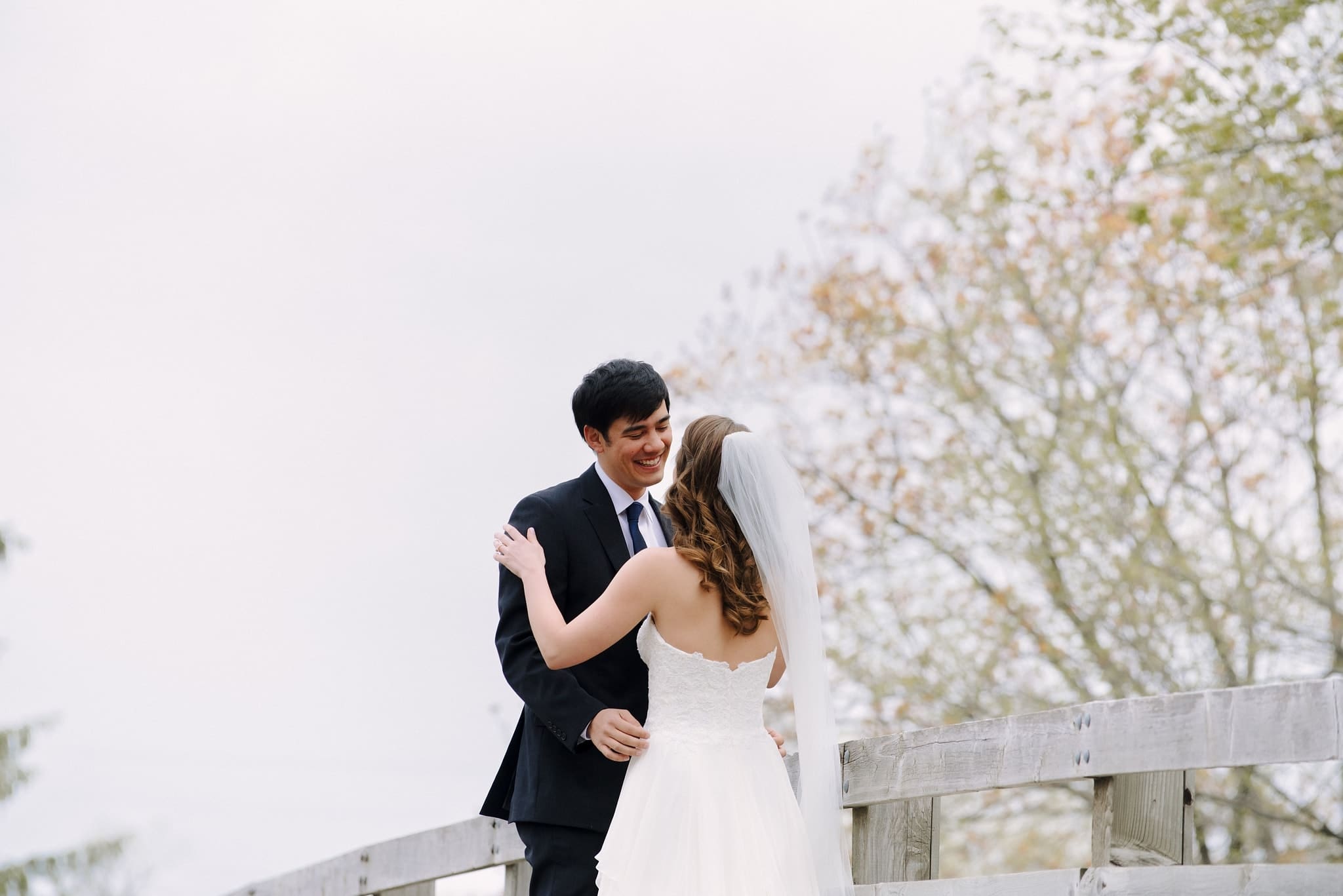 groom reacting to his bride in their minneapolis wedding