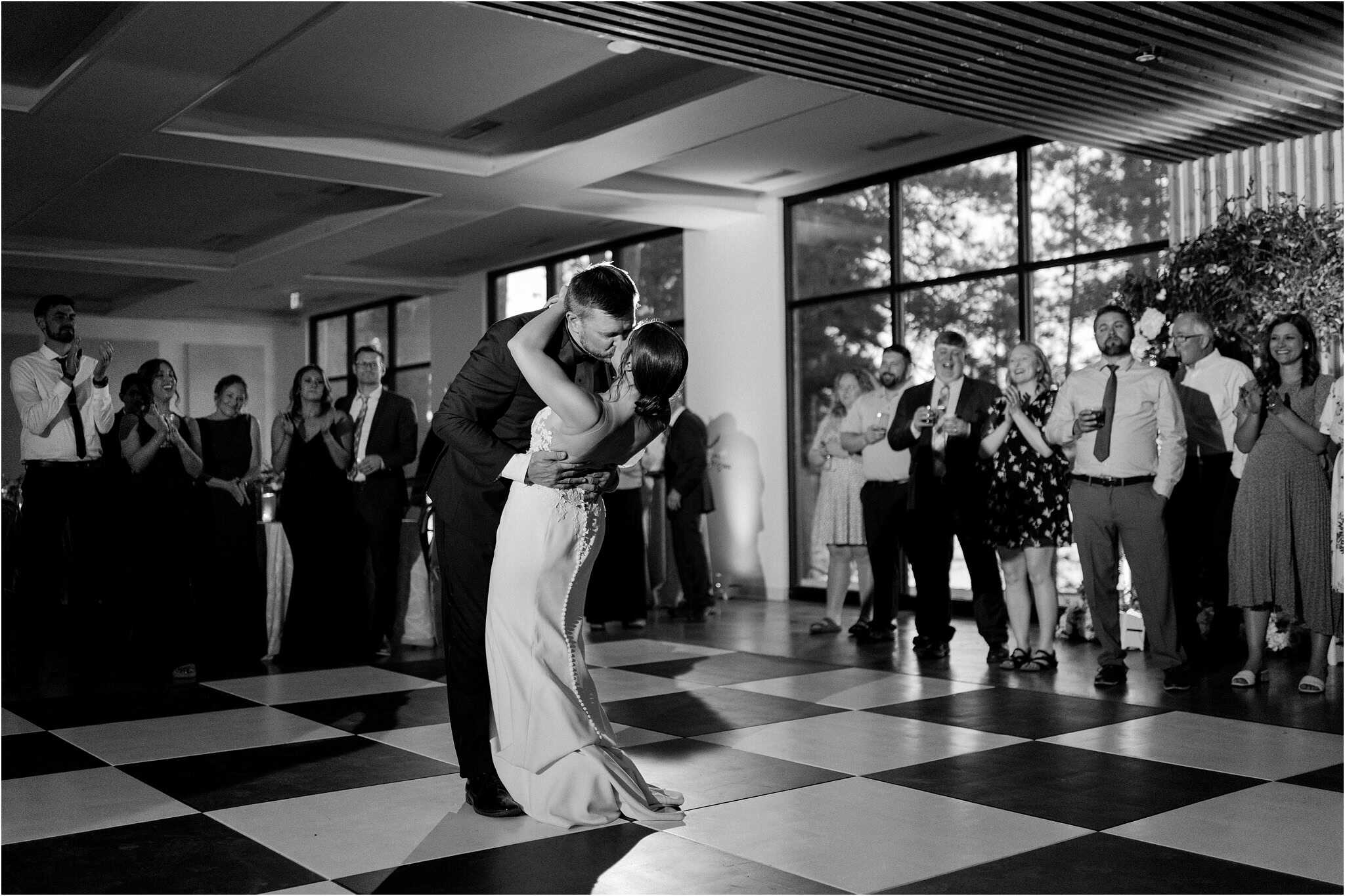black and white photo of couples first dance during catalyst wedding day